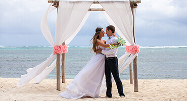 wedding couple getting married on beach