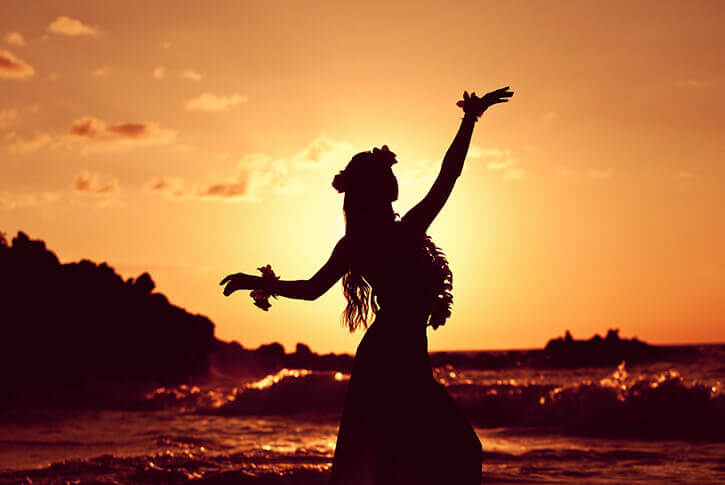 hawaiian woman wearing lei as headpeice