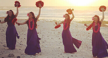 close-up of straw skirt wore by hula dancer