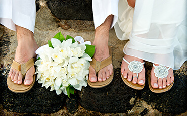 close-up of groom and bride's feet