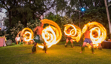 fire hula dancers performing