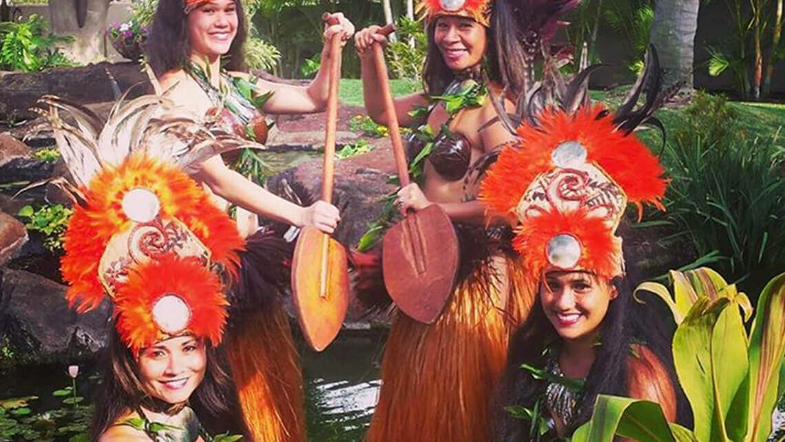 hula dancers in traditional costumes