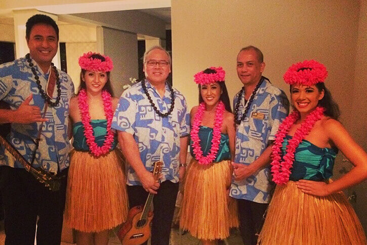 group hula dancers in traditional costume