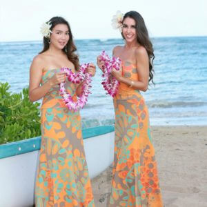 two female hula dancers with beautiful lei