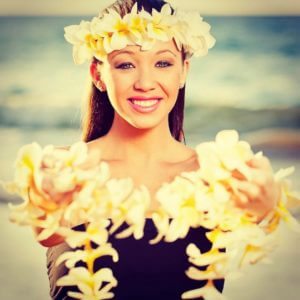 hawaiian woman with offering hawaiian lei